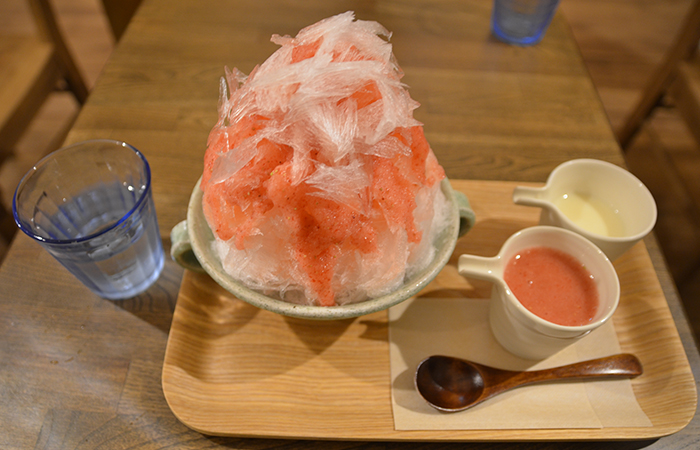 Fluffy shaved ice filled with fresh strawberry sauce